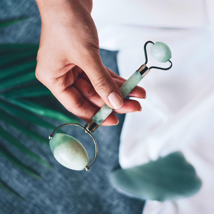 Woman Holding Jade Roller