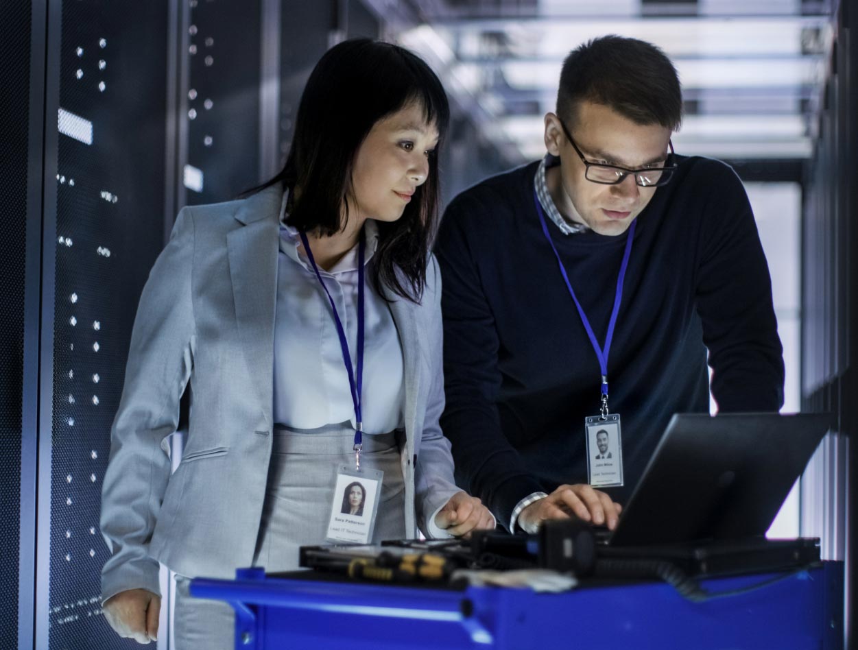 Man and Woman in Server Room